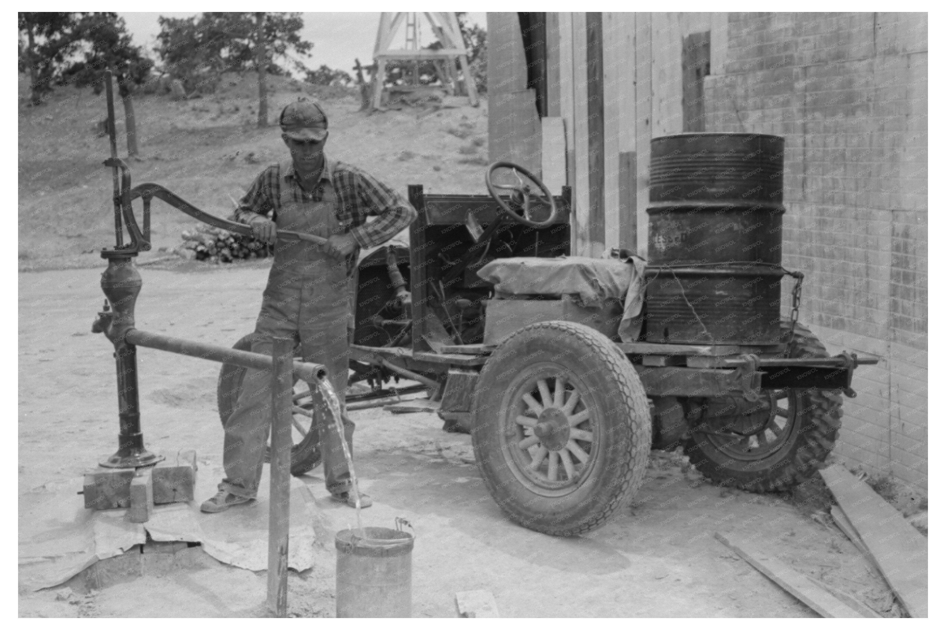 Homesteader Pumps Water in Pie Town New Mexico 1940