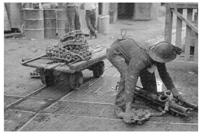 Miner Loading Drilling Equipment in Mogollon New Mexico 1940