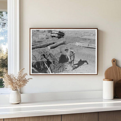 Faro Caudill Shoveling Dirt in Pie Town New Mexico 1940