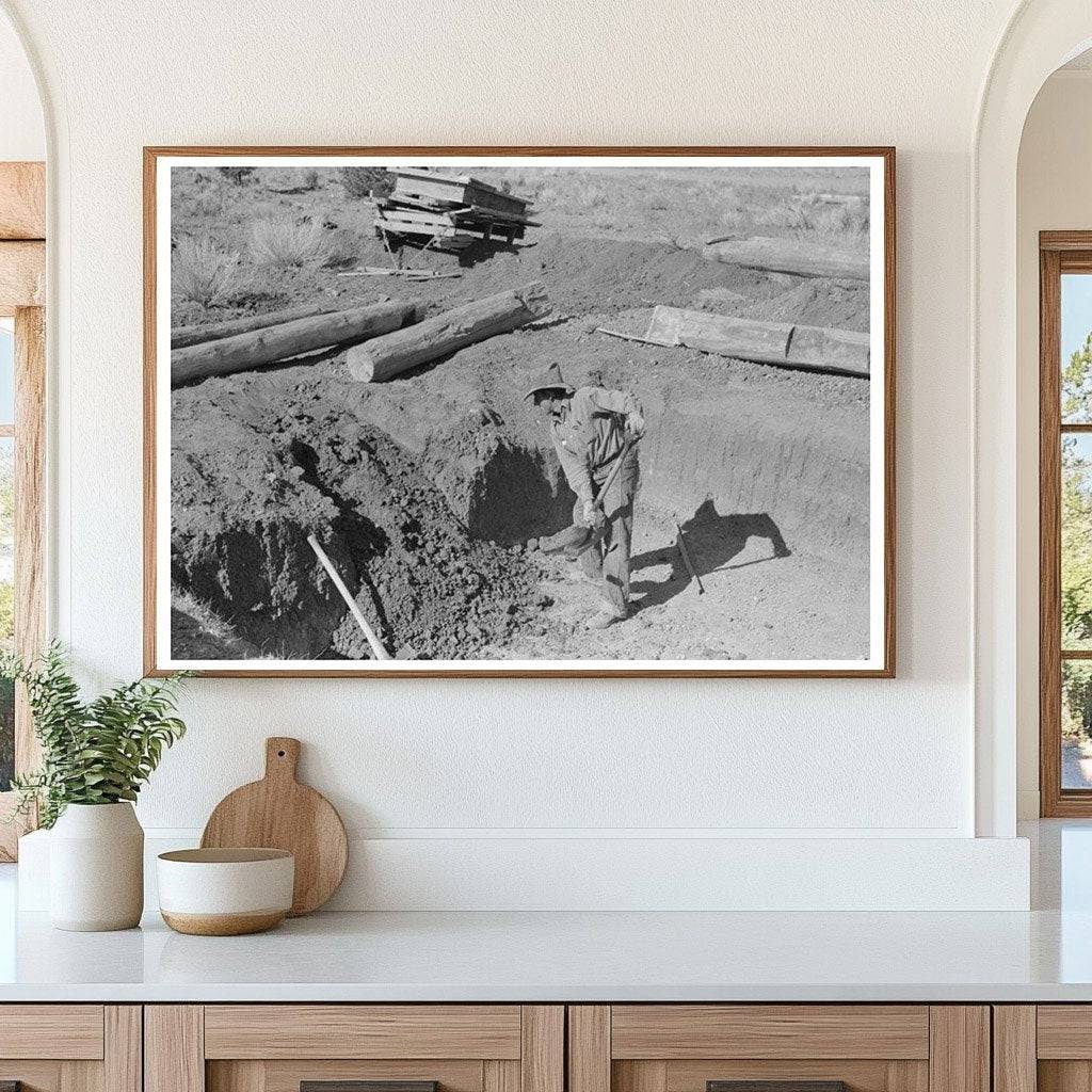 Faro Caudill Shoveling Dirt in Pie Town New Mexico 1940