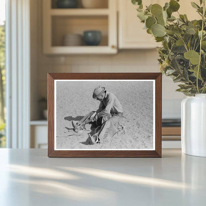 Cowboy Testing Stirrup for Bronc Riding Quemado NM 1940