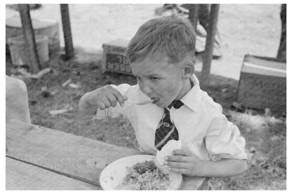 Child Eating Dinner at Community Sing Pie Town New Mexico 1940