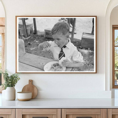 Child Eating Dinner at Community Sing Pie Town New Mexico 1940