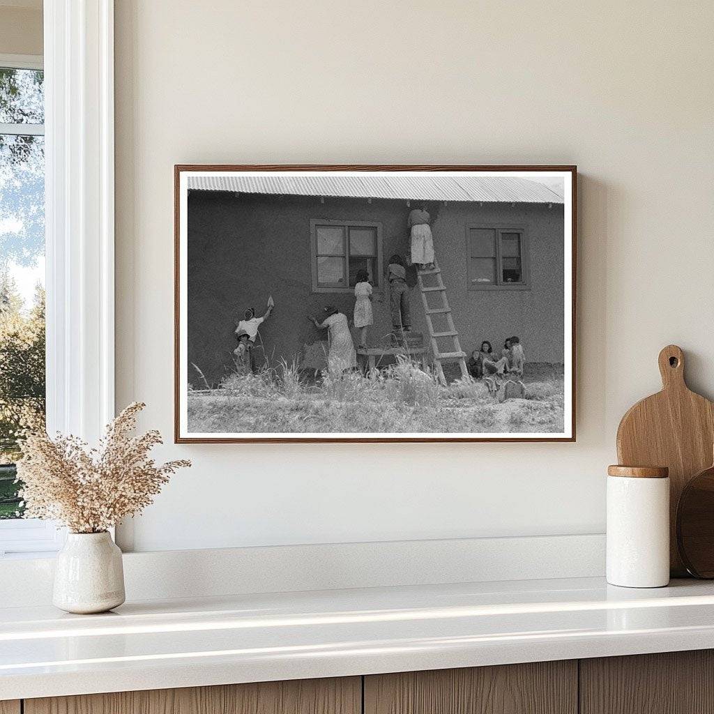 Plastering an Adobe House in Chamisal New Mexico 1940