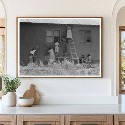 Plastering an Adobe House in Chamisal New Mexico 1940