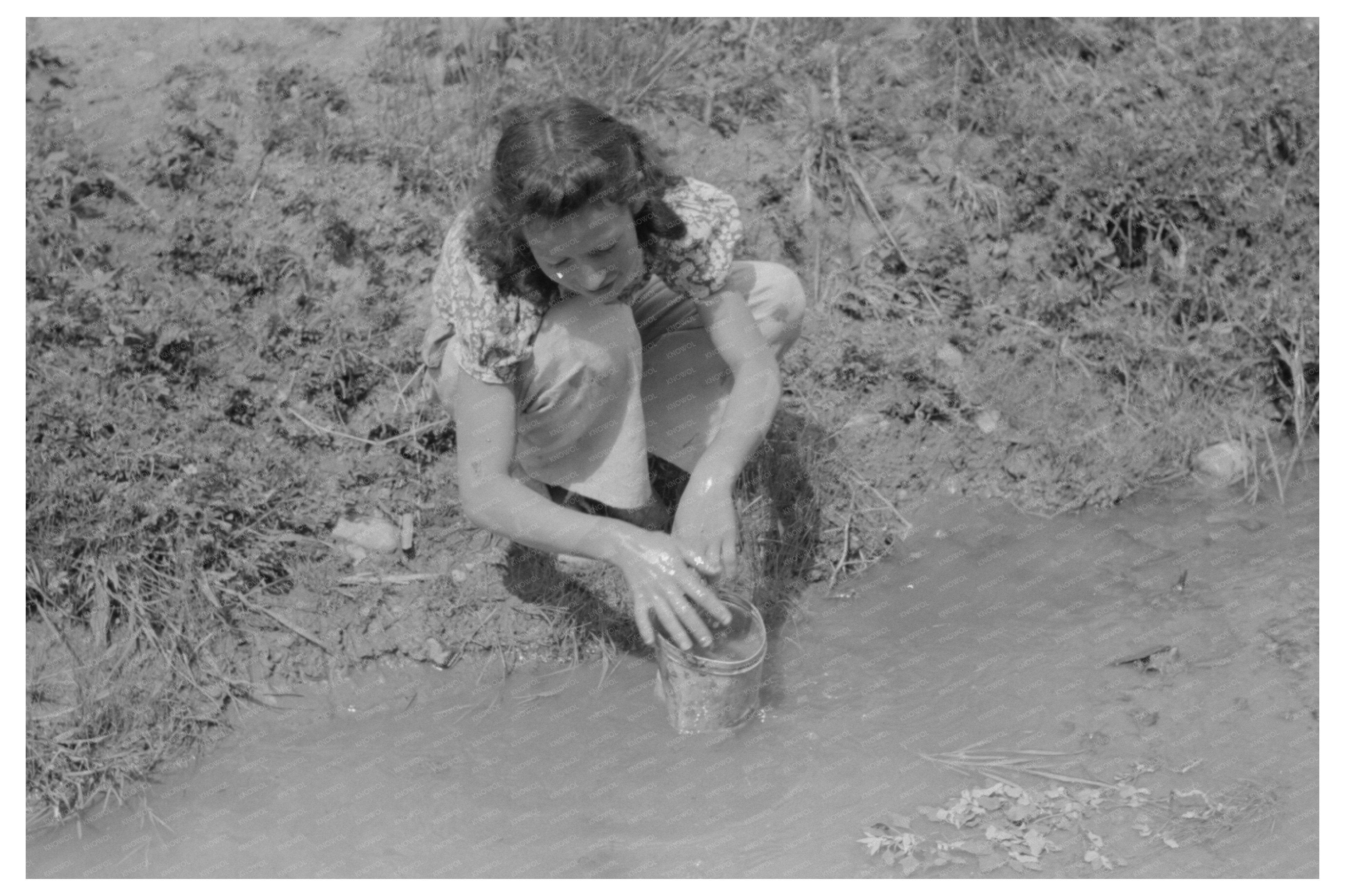 Spanish-American Woman Washing Clothes in Chamisal 1940