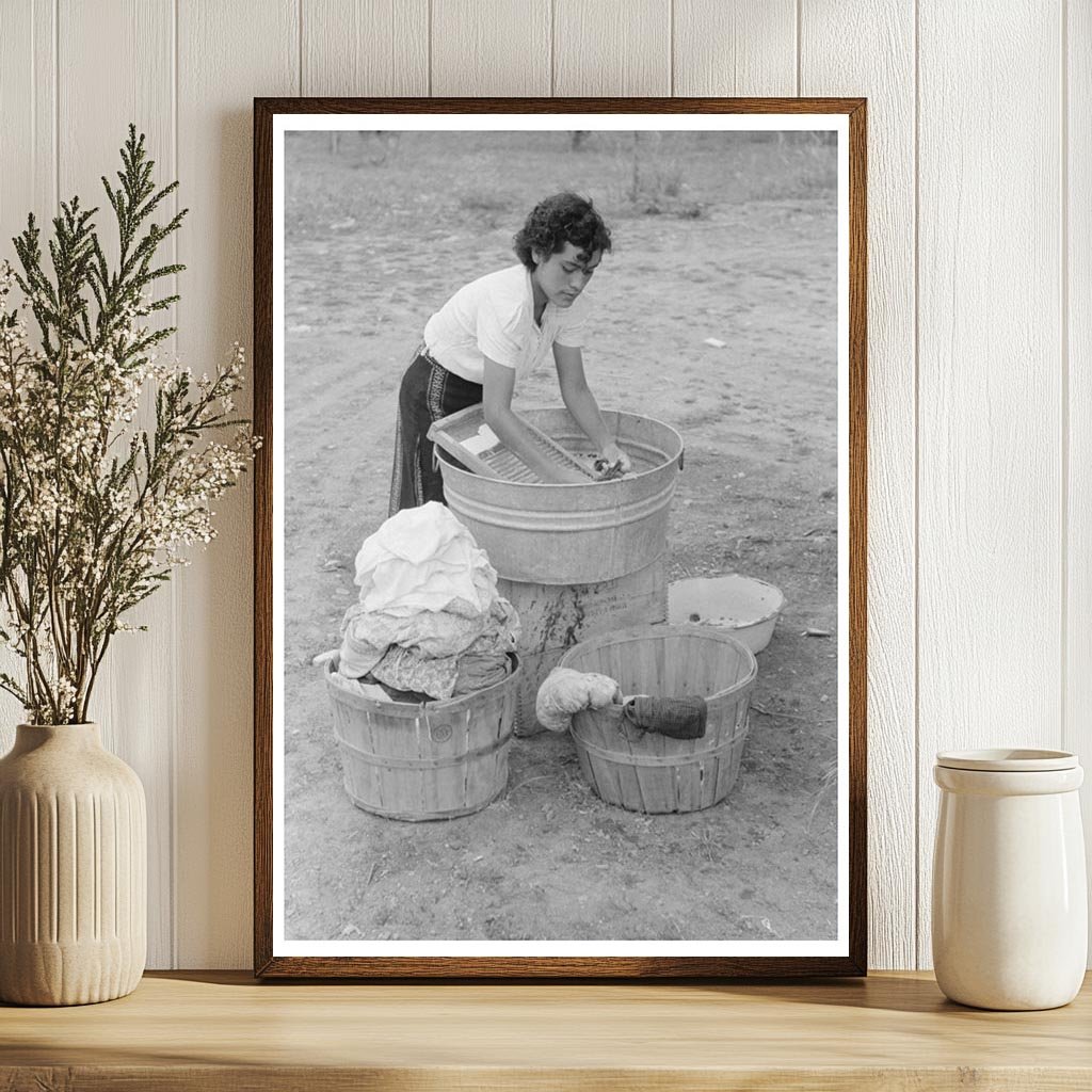 Daughter of Farmer Washing Clothes Chamisal New Mexico 1940