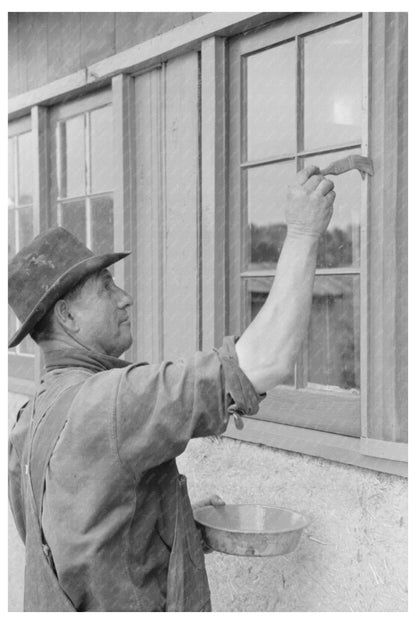 Spanish-American Farmer Painting Windows July 1940