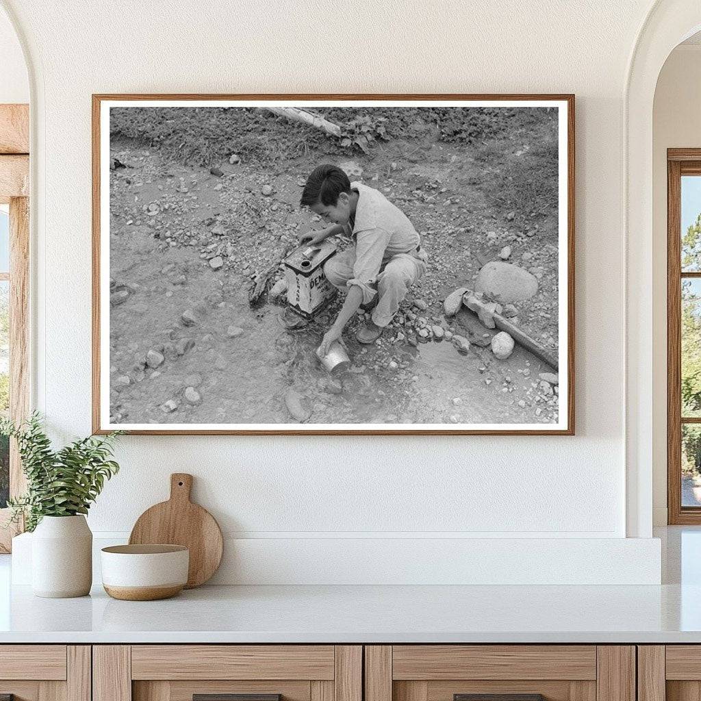 Spanish-American Boy Drawing Water in Chamisal 1940