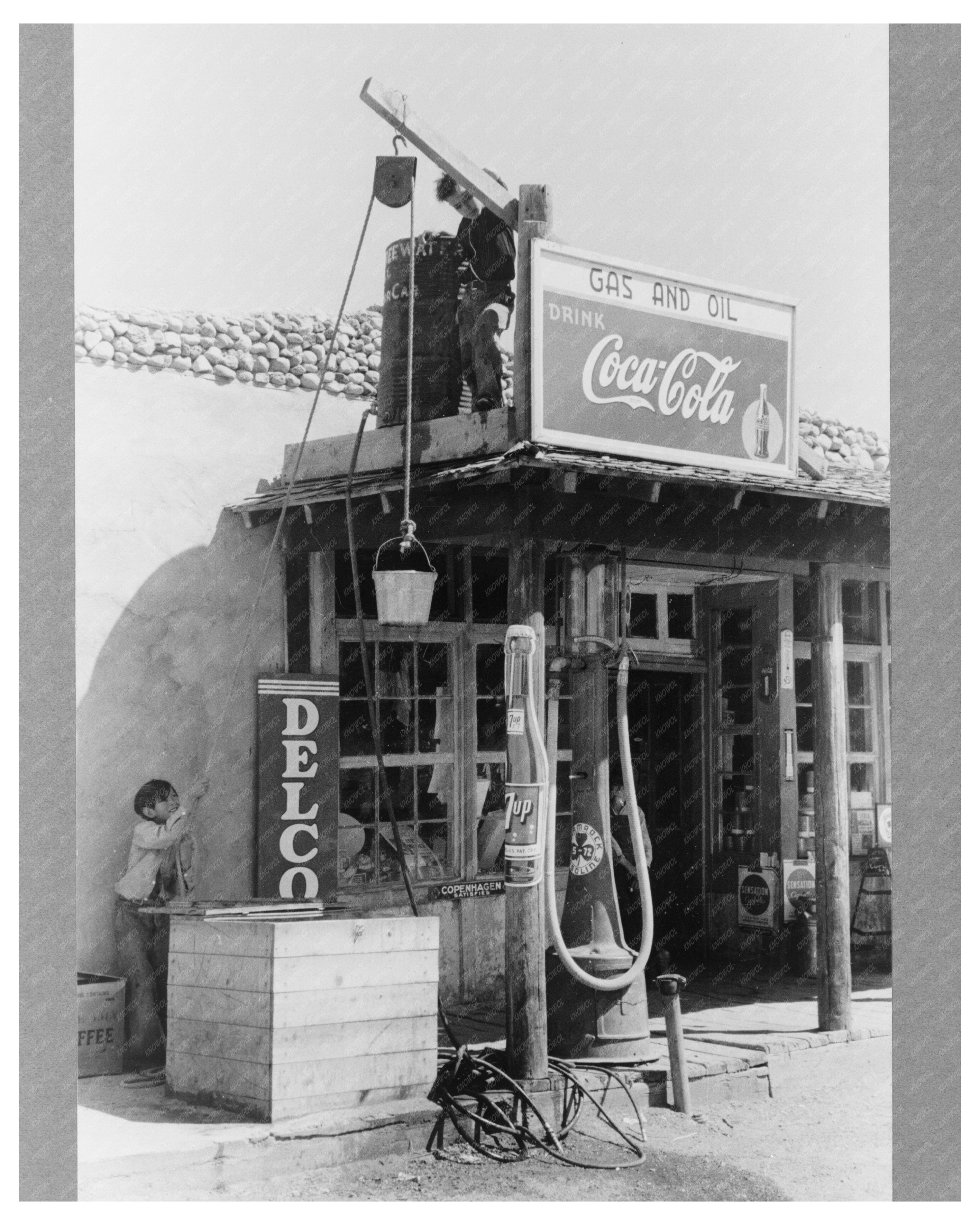 Boys Collecting Water at Arroyo Hondo Filling Station 1940