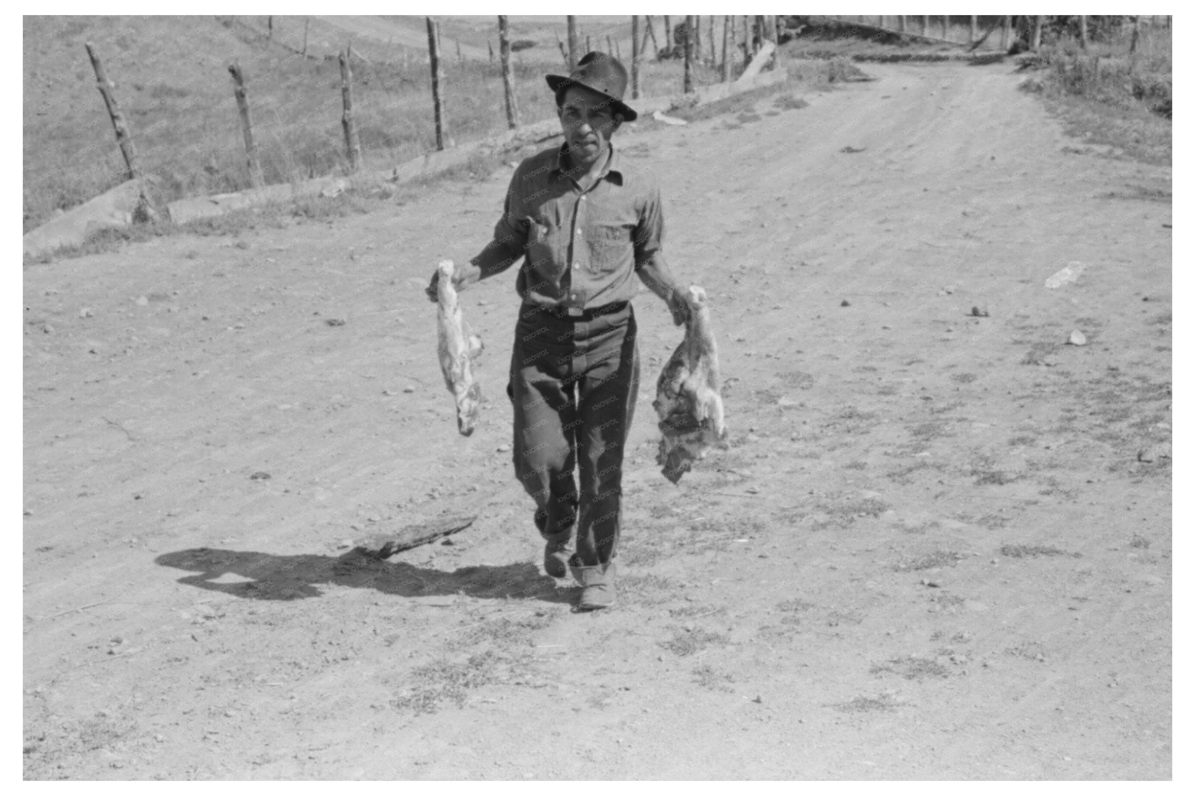 Spanish-American Farmer with Fresh Pork New Mexico 1940