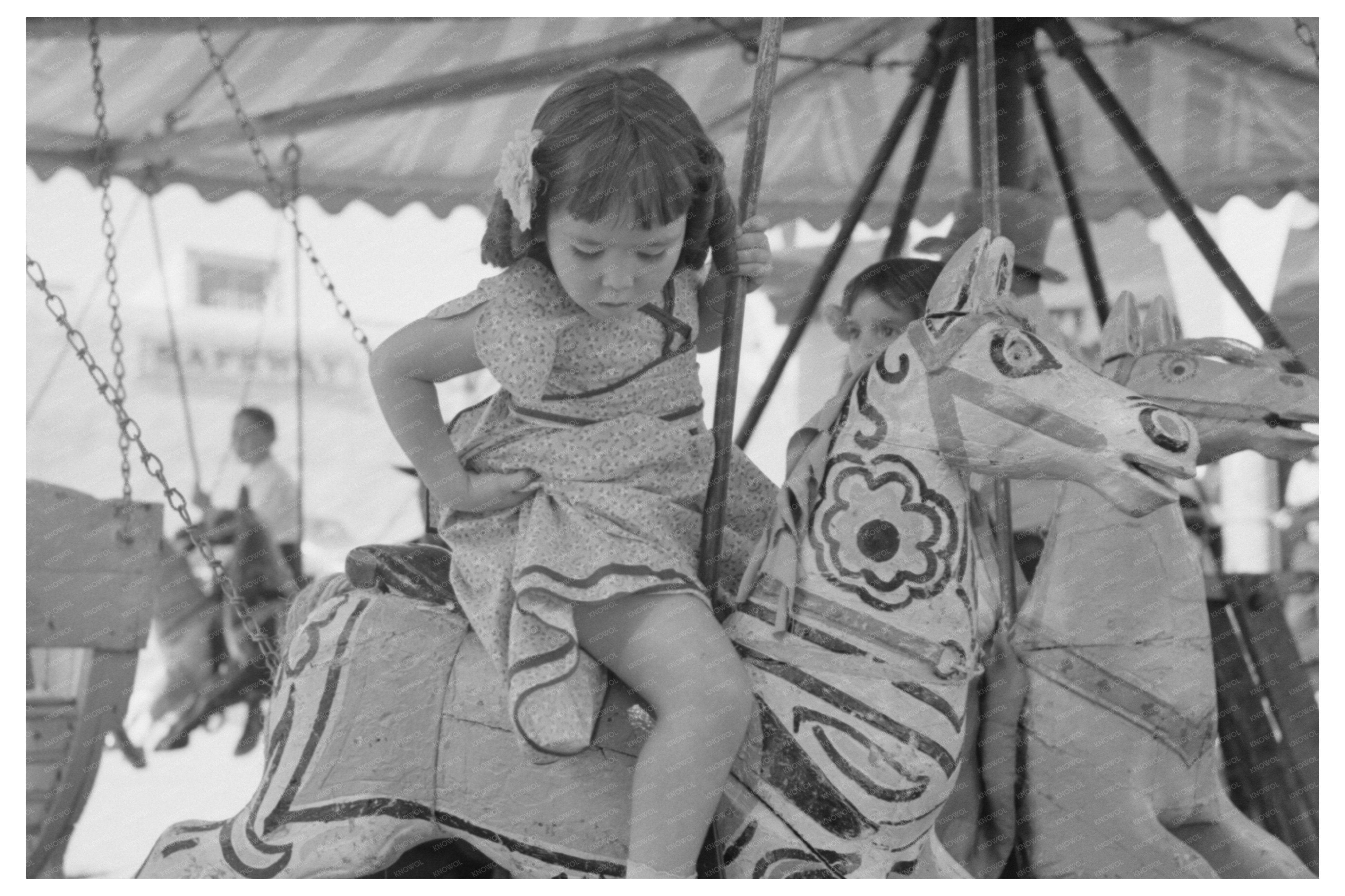 Young Girl on Merry-Go-Round Horse Taos Fiesta 1940