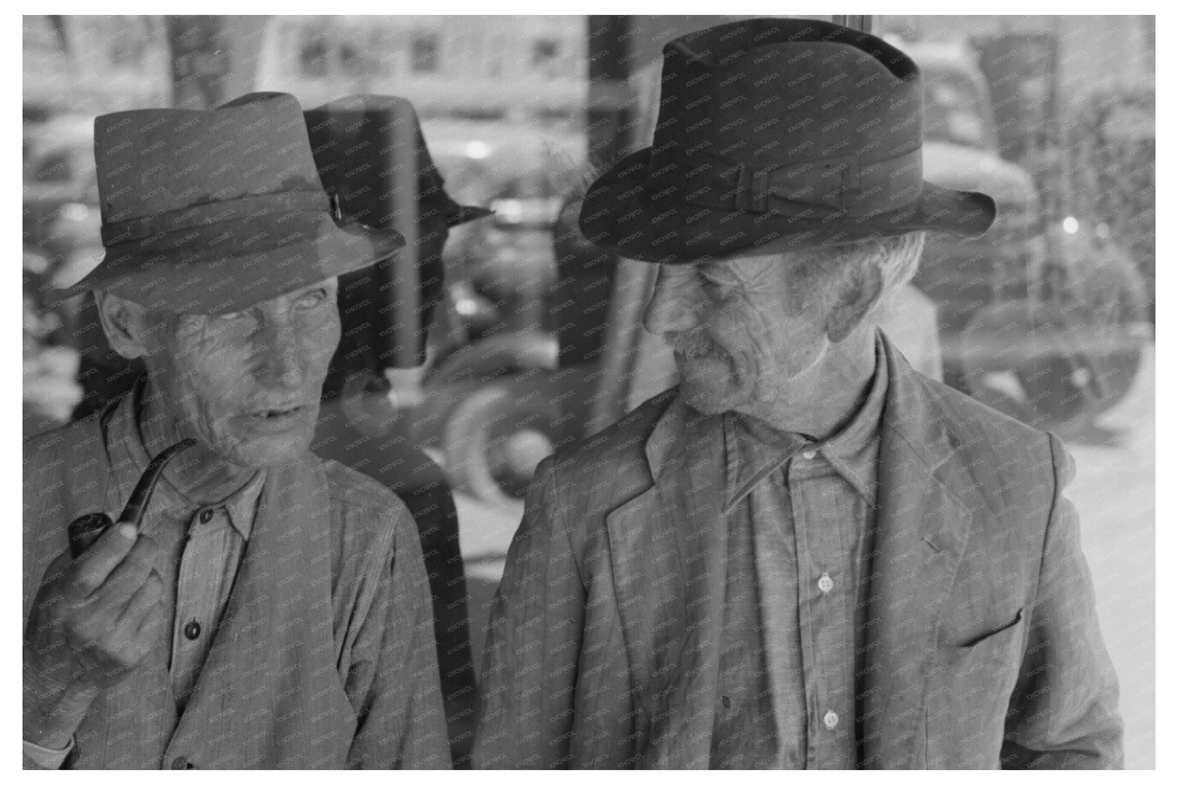 Men Conversing on Taos Streets July 1940