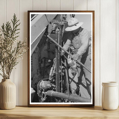 Worker Greasing Machinery at Farm Cooperative Utah 1940