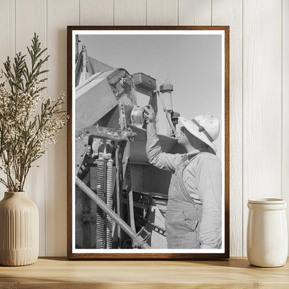 Farm Security Administration Worker Greasing Machinery 1940