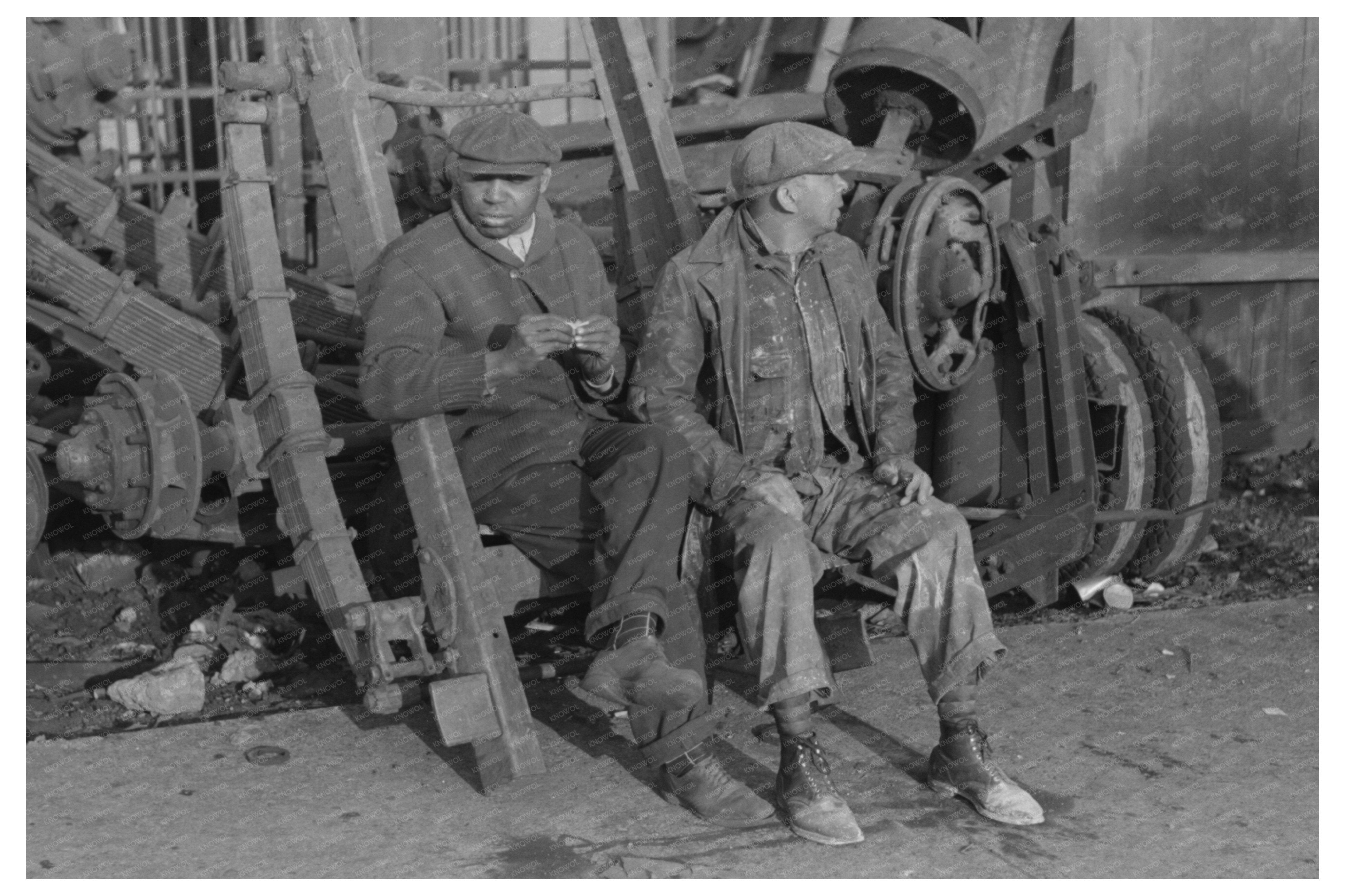 Men Seated on Truck in South Side Chicago Junkyard 1941