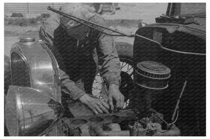 Farm Worker Fixing Car in Caldwell Idaho June 1941