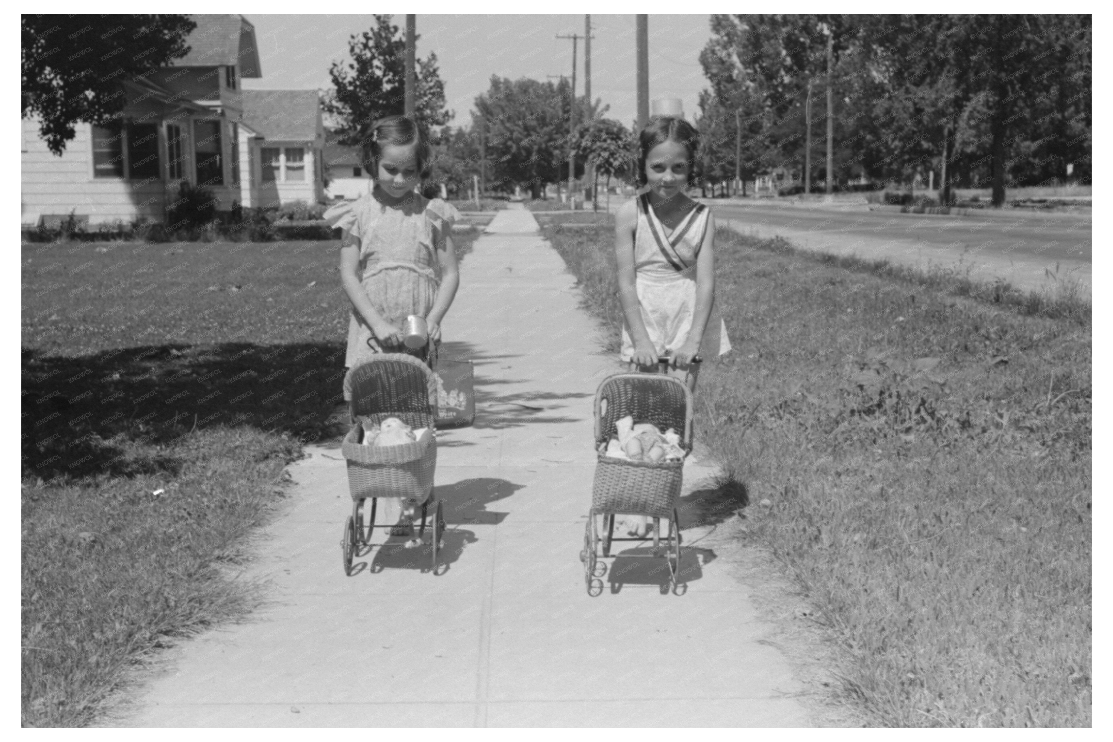 Young Girls Playing with Dolls in Caldwell Idaho 1941