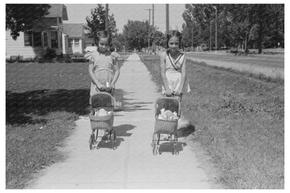 Young Girls Playing with Dolls in Caldwell Idaho 1941