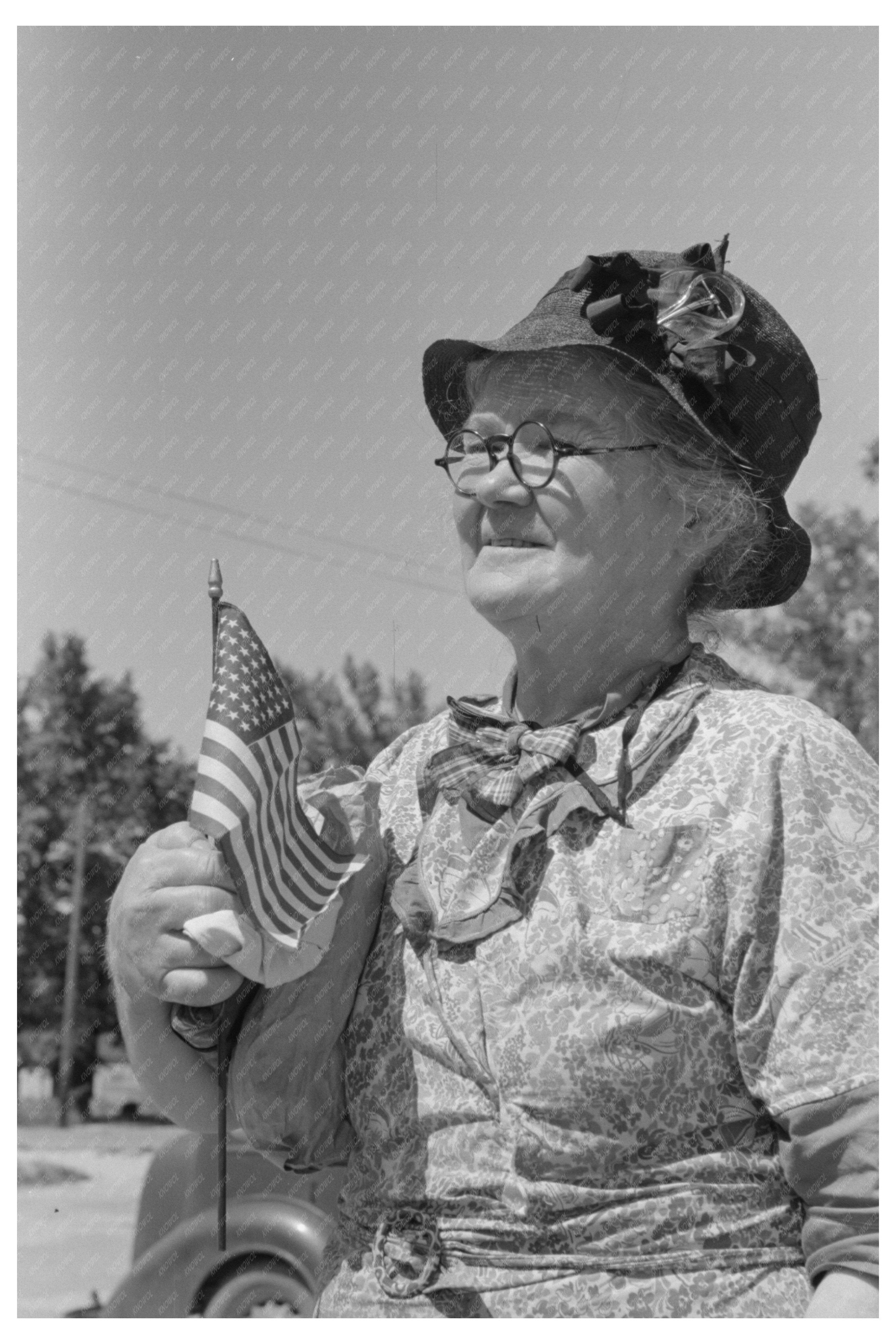 Woman with American Flag in Caldwell Idaho 1941