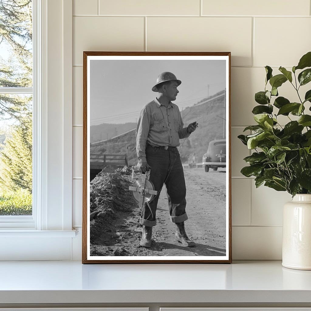 Chain Man Surveying at Shasta Dam California 1941