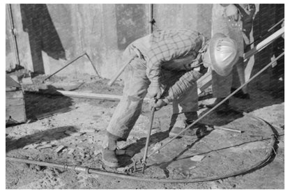Workman at Shasta Dam December 1941 FSA/OWI Collection