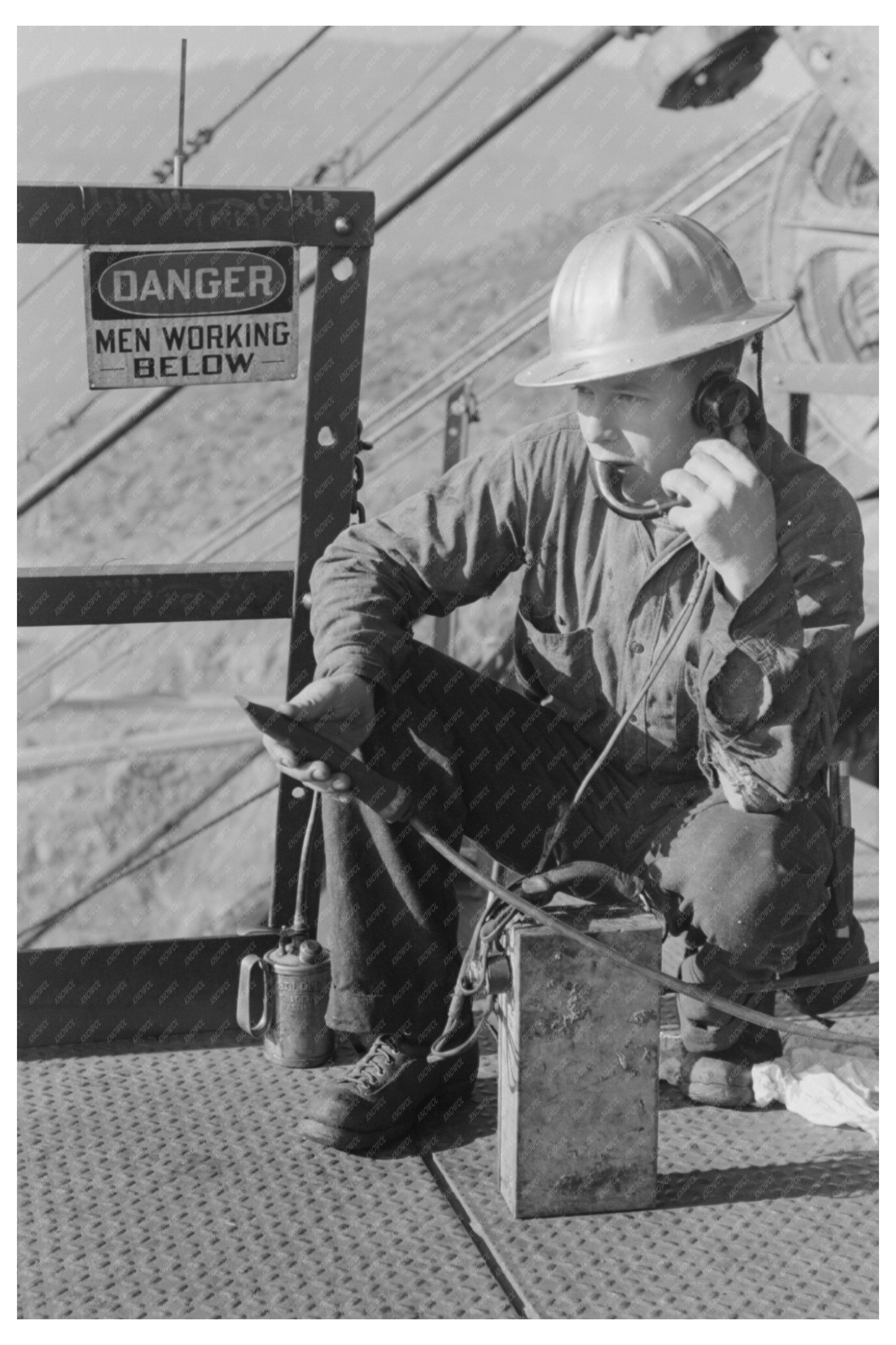 Workman Using Telephone at Shasta Dam December 1941