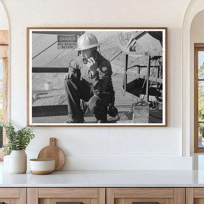 Workman on Telephone at Shasta Dam December 1941