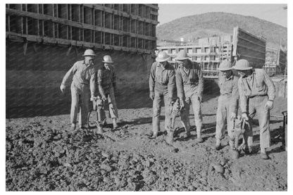 Workmen Spreading Concrete at Shasta Dam December 1941