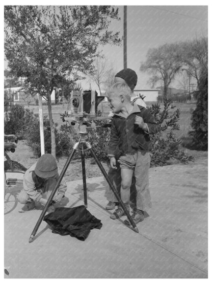 Children Inspecting Camera at Camelback Farms 1942