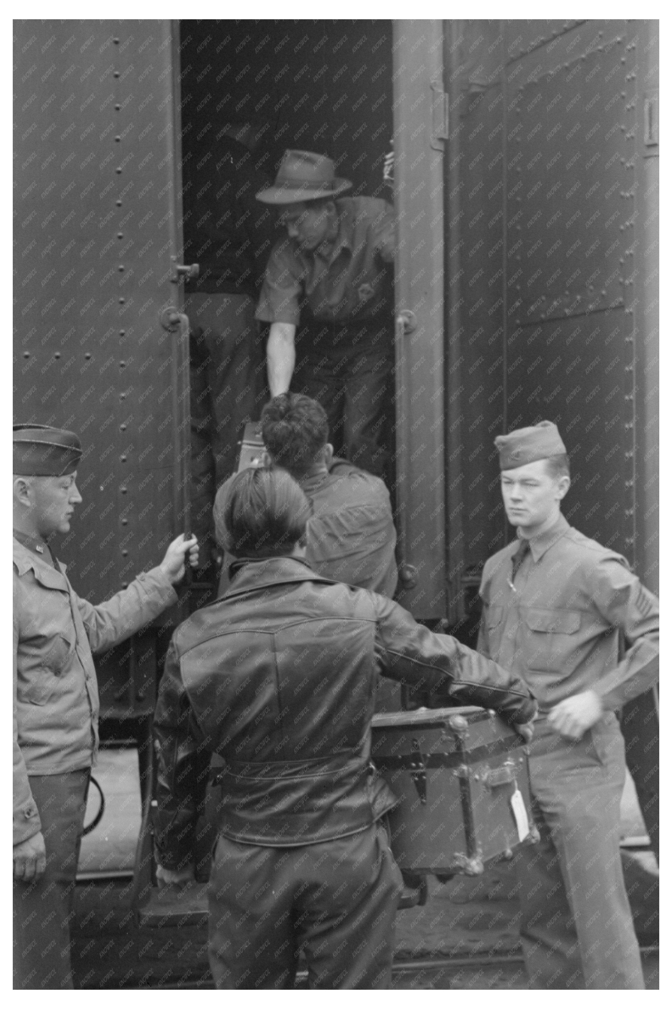 Soldiers Supervise Baggage Loading for Japanese-Americans 1942