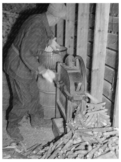 W.H. Cox Shelling Corn for Chickens Iowa November 1936