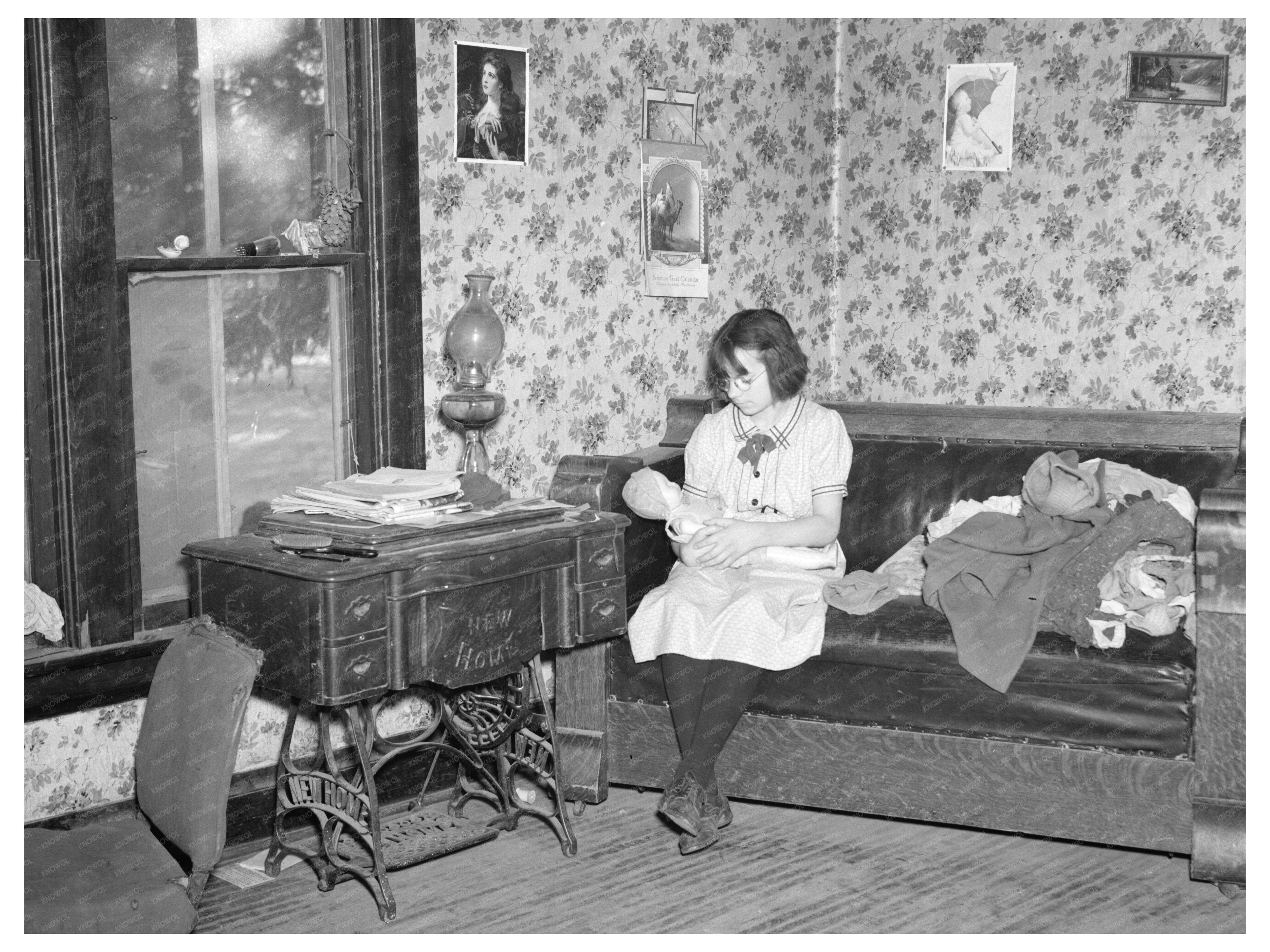 Child Playing with Doll in Iowa Home December 1936