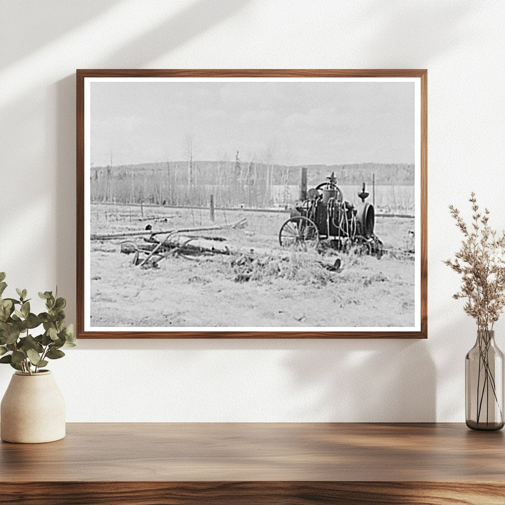 Rusting Engine and Old Plow in Iron River Michigan 1937