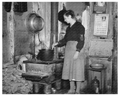 Mrs. Lon Allen Stirring Soup Iron River Michigan May 1937