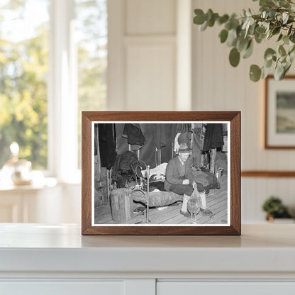 Farmer Feeding Chicken Indoors in Michigan May 1937