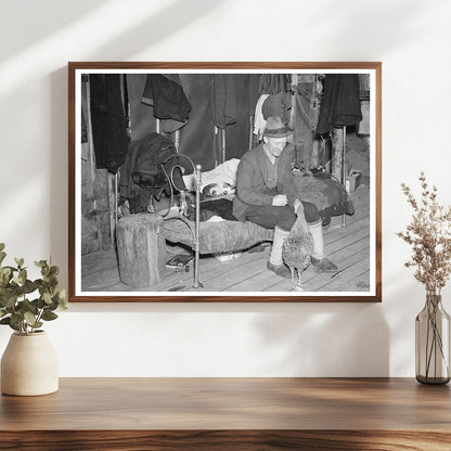 Farmer Feeding Chicken Indoors in Michigan May 1937