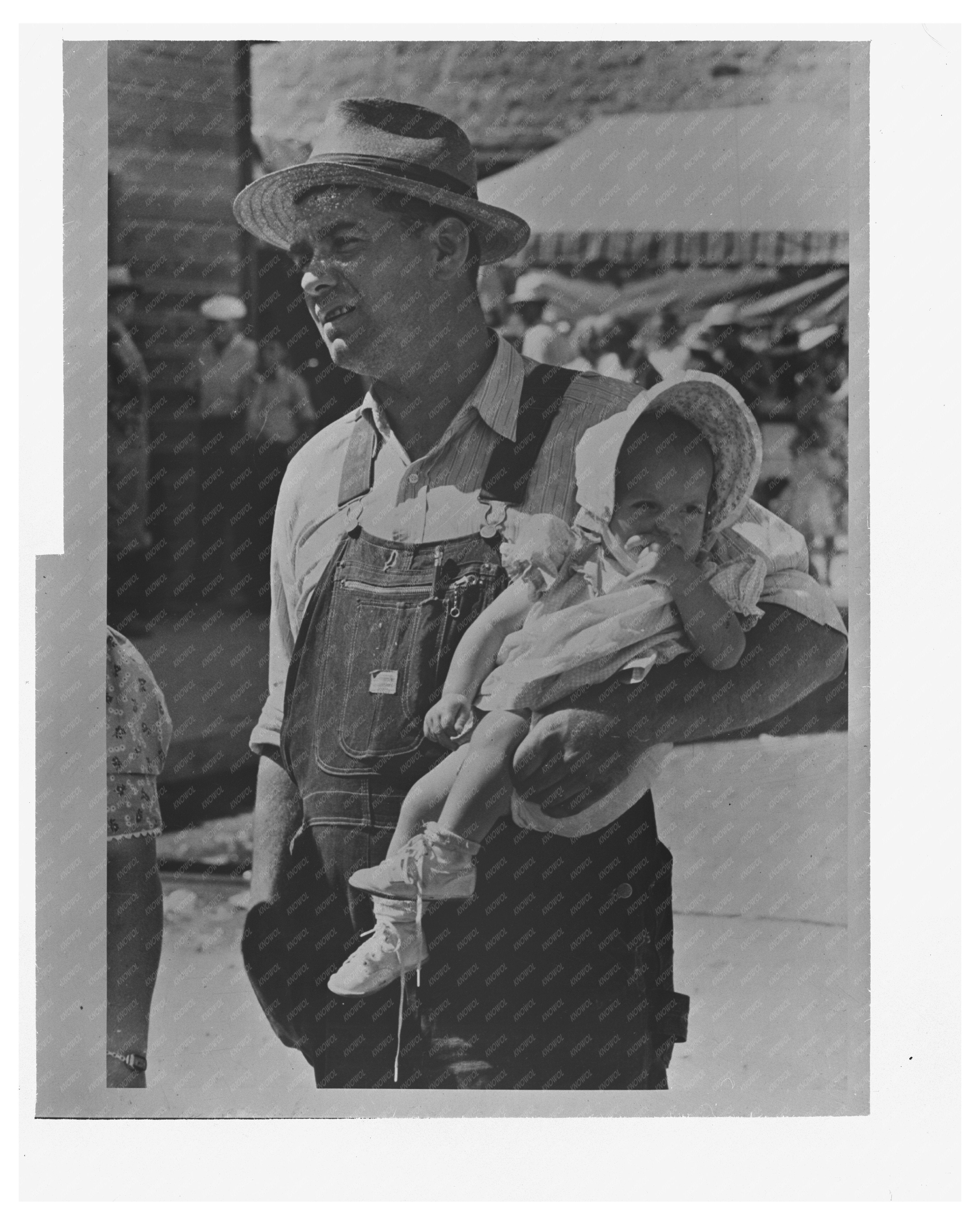 Farmer and Daughter Celebrate Independence Day 1941