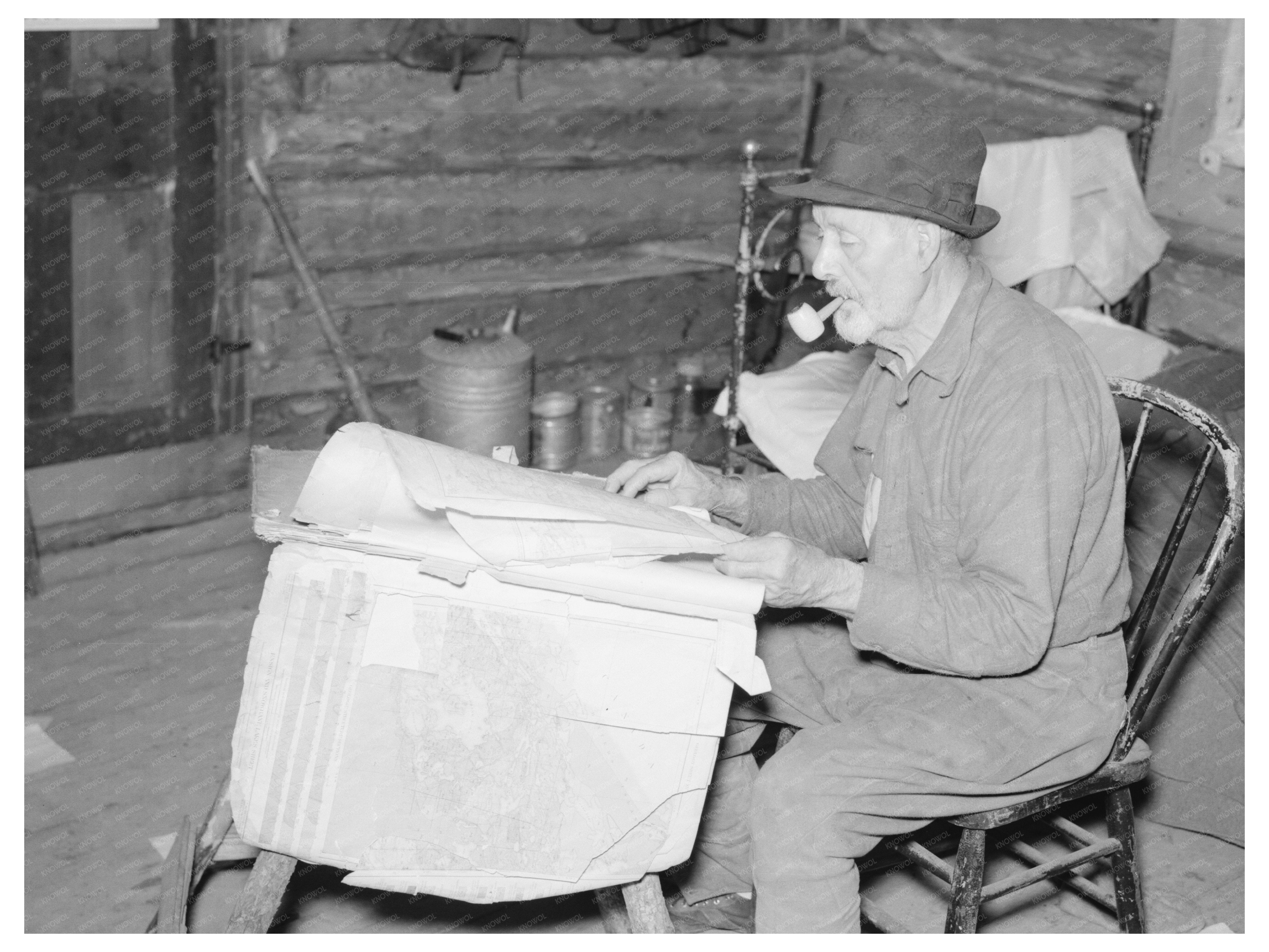 William Besson Examining Geological Maps August 1937