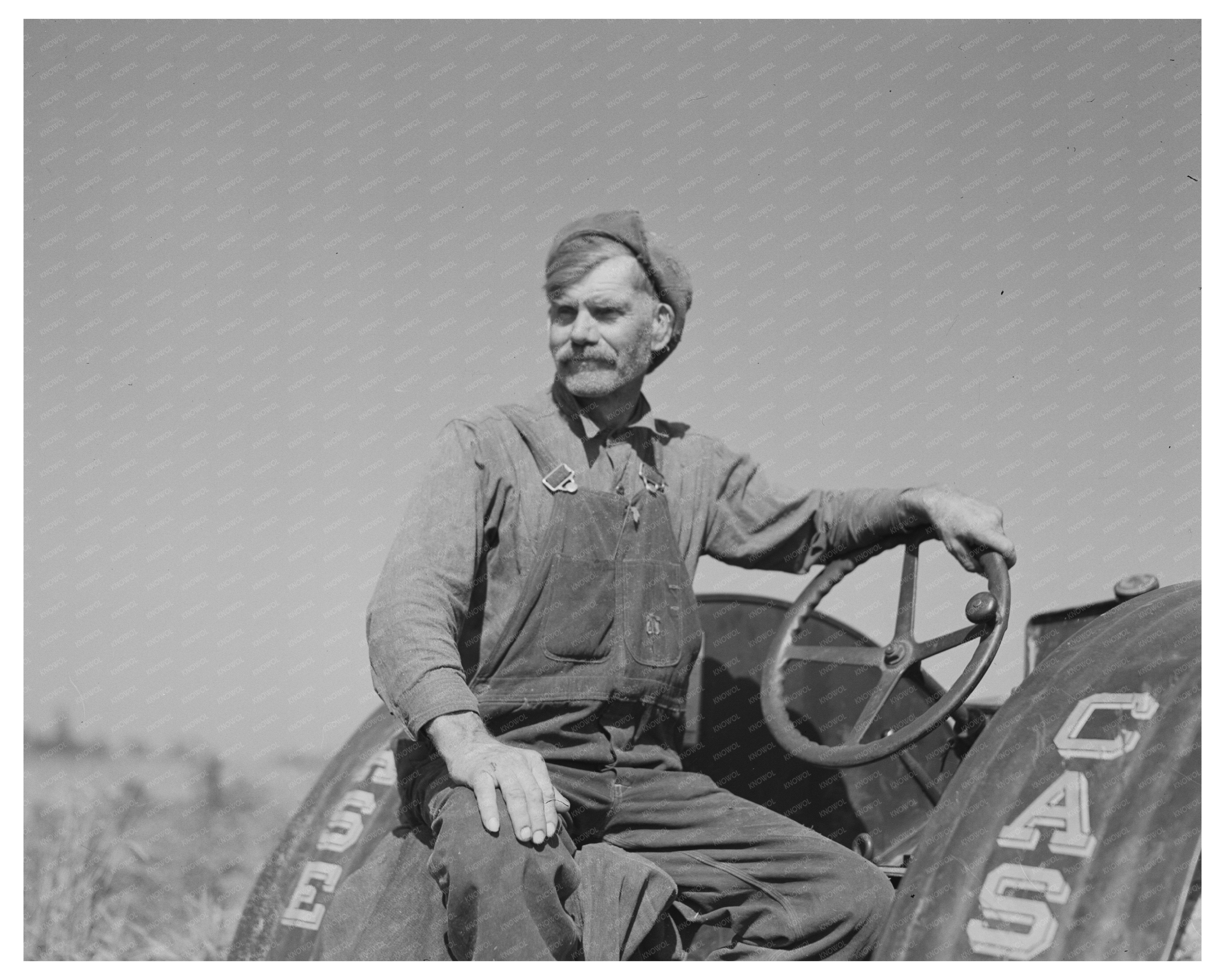 1937 Farmer on Tractor in Little Rock Minnesota