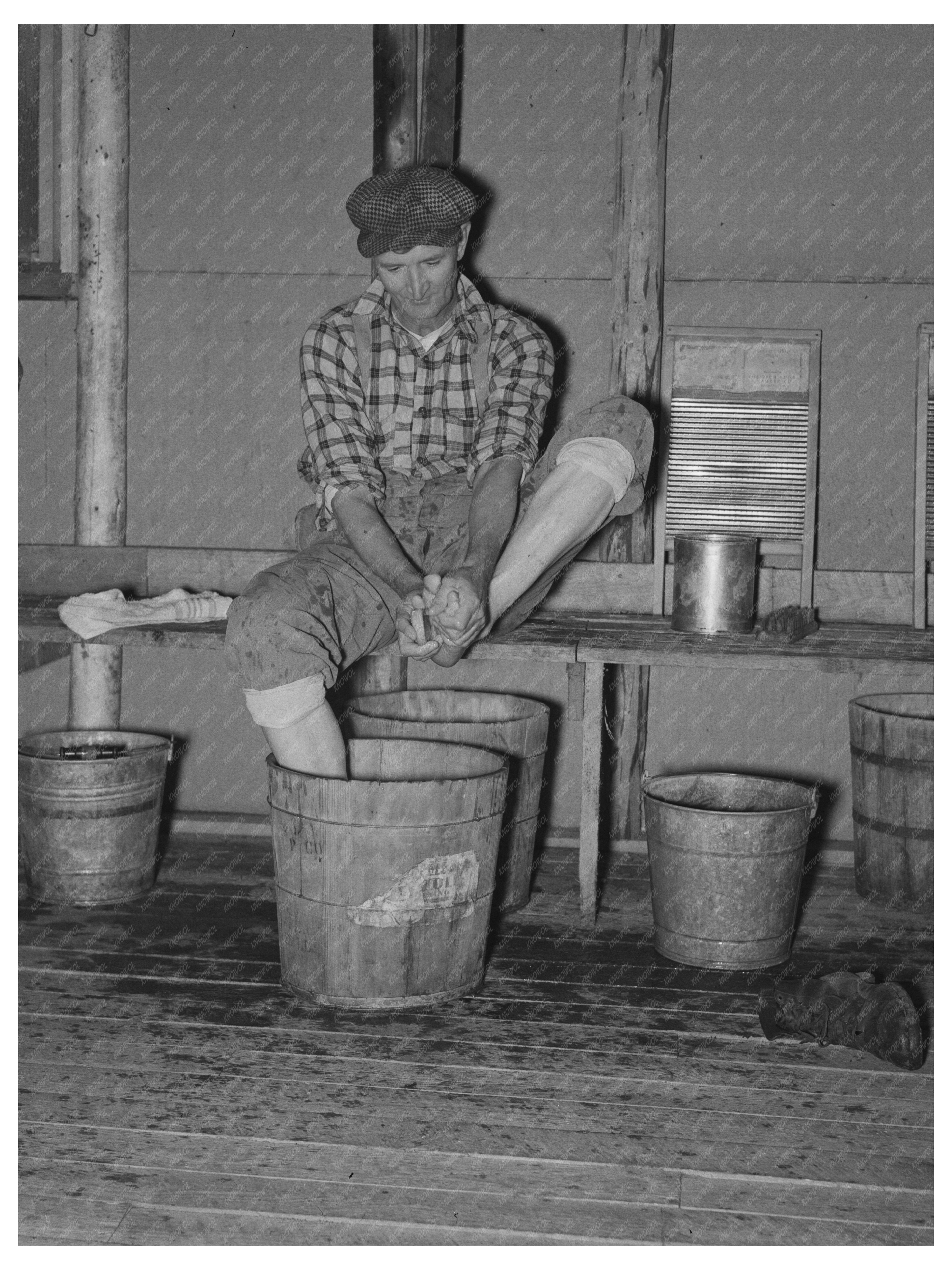 Lumberjack Washing Feet at Camp Effie Minnesota 1937