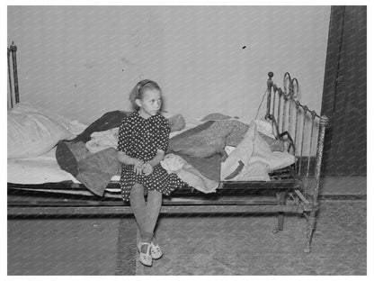 Daughter of A.O. Ryland with Quilts in 1937 North Dakota