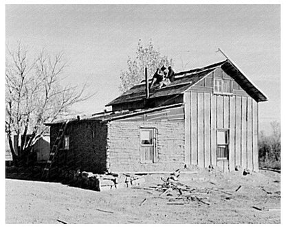 Farmer and Wife Roofing Farmhouse in North Dakota 1937