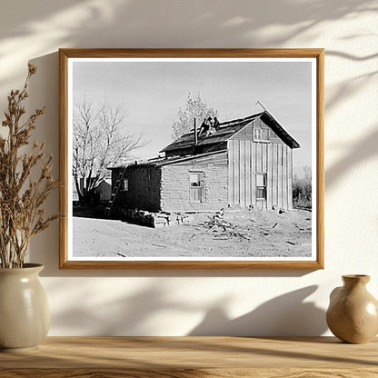 Farmer and Wife Roofing Farmhouse in North Dakota 1937