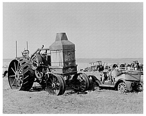 1937 Junkyard Scene with Tractor and Automobile in North Dakota