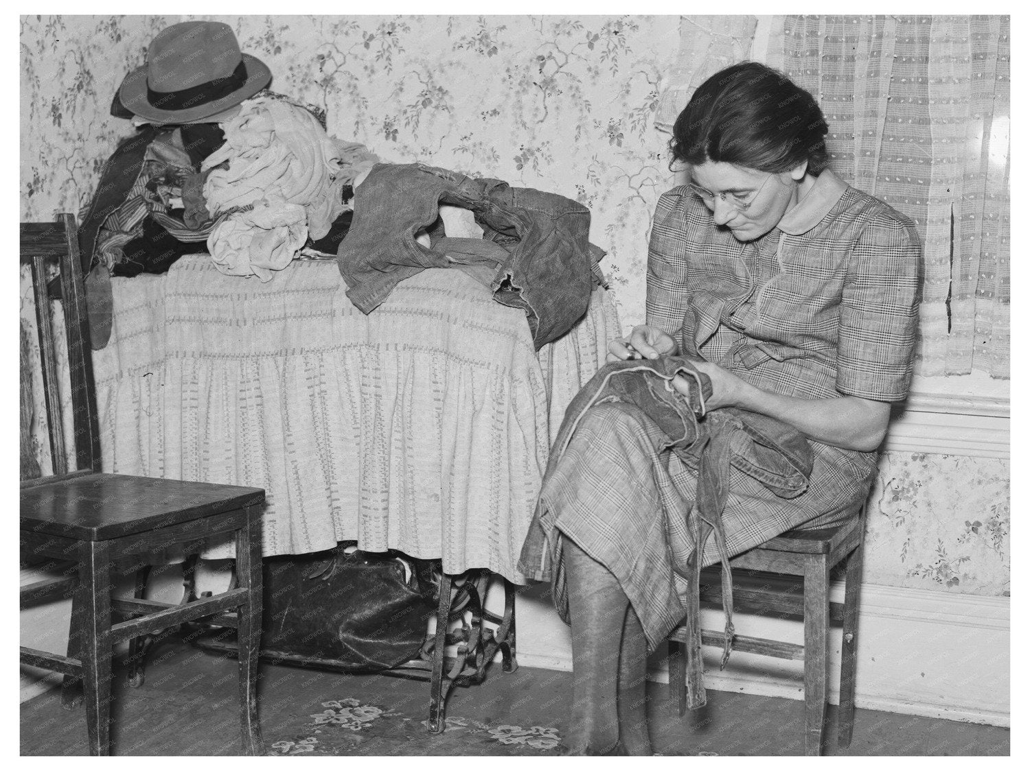 Mrs. Gallagher Patching Clothes in Crosby North Dakota 1937