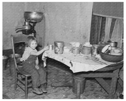 Daughter of John Baker in North Dakota Kitchen 1937