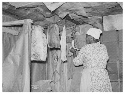 Wife of Sharecropper Prepares Fatback May 1938
