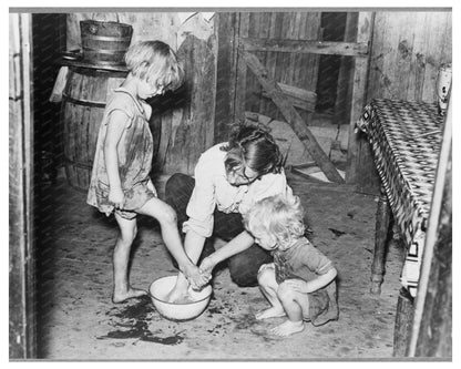 Mother Washing Daughters Feet in 1938 Sharecropper Shack