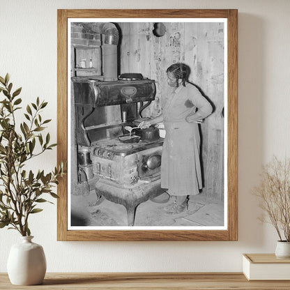 Woman Preparing Gravy in Sharecropper Cabin May 1938